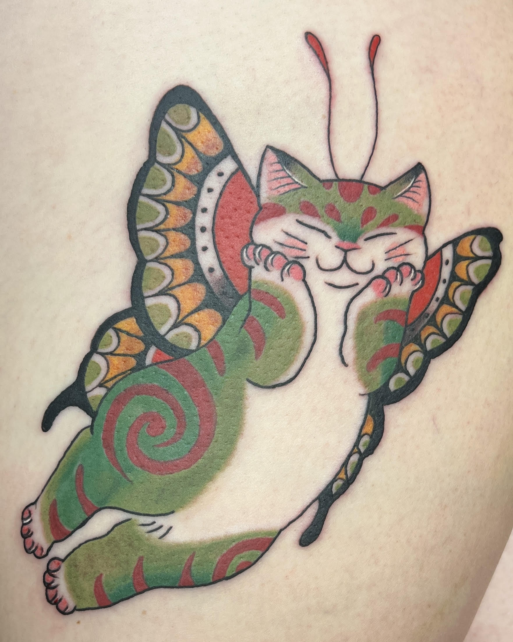 Traditional color cat butterfly hybrid tattoo